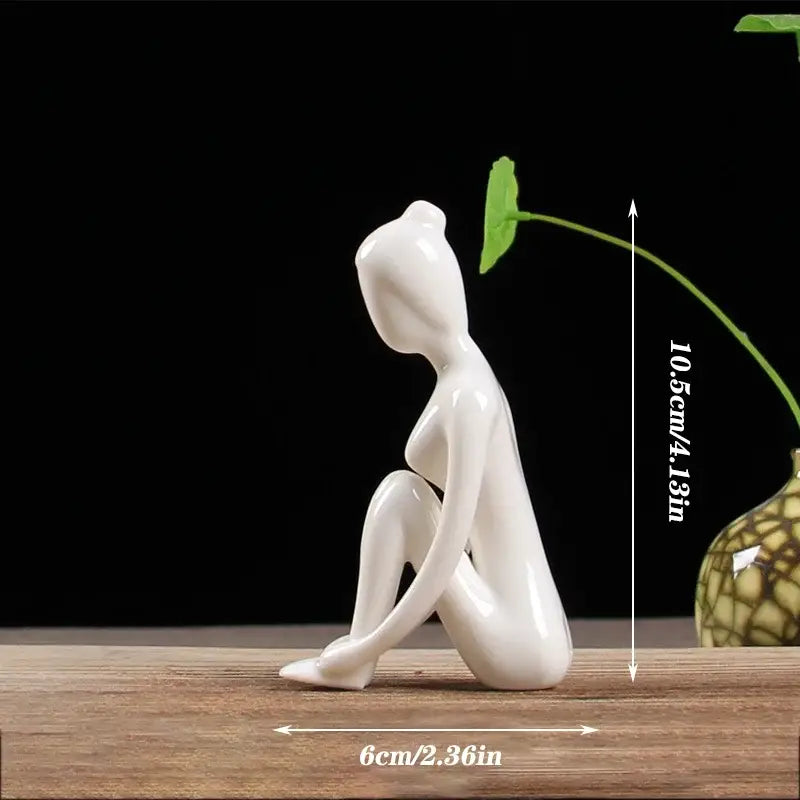 Abstract white porcelain yoga figure with smooth glossy finish and minimalist design for living room decorbites decor