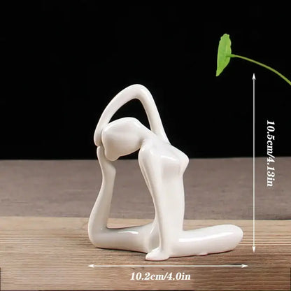 A sleek glossy white porcelain yoga figure in an abstract pose for living room decorbites abstract yoga decor