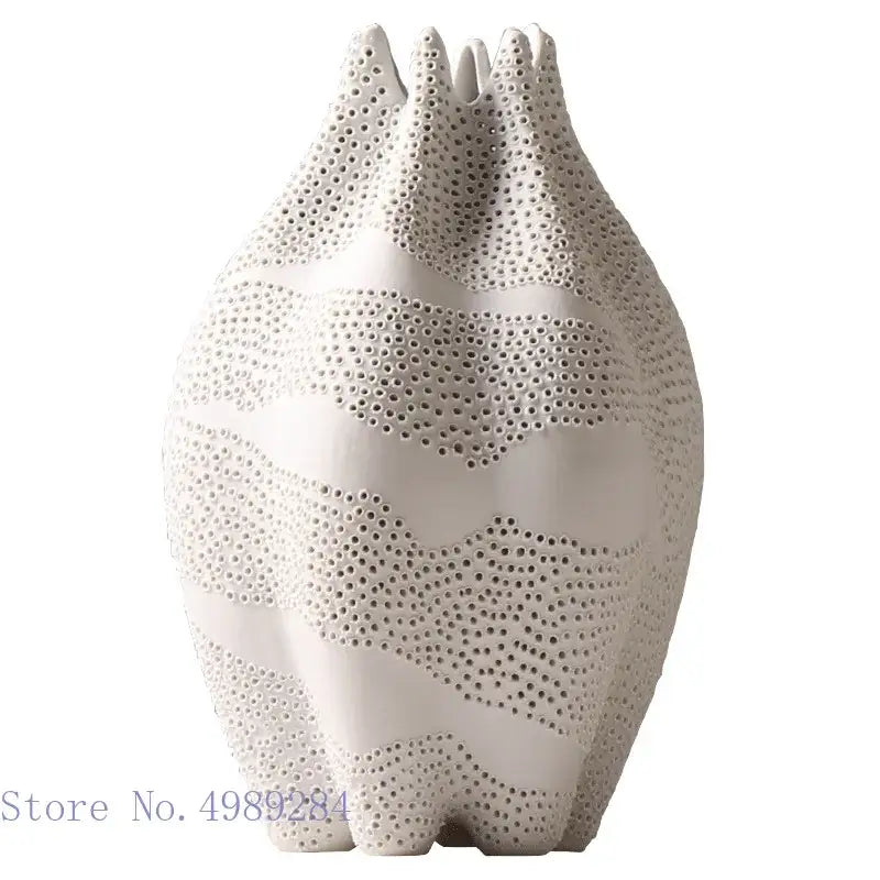 Abstract white textured ceramic vase with wavy bands and dot pattern decorbites dot pattern for living room decor