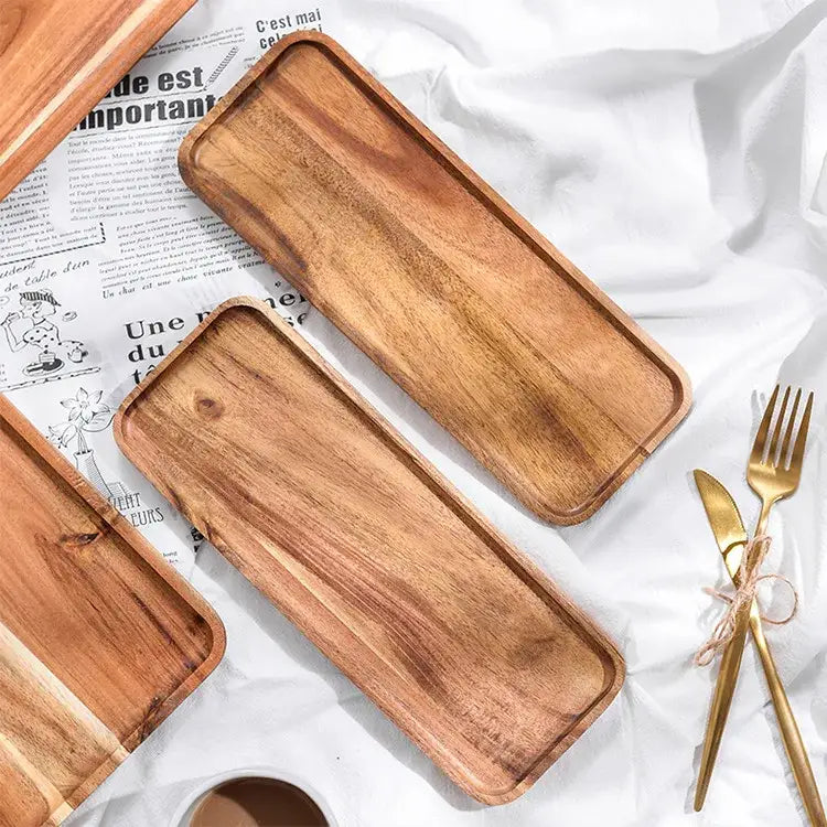 Rectangular acacia wood breakfast tray with warm natural wood grain finish and rounded edges for dining room use