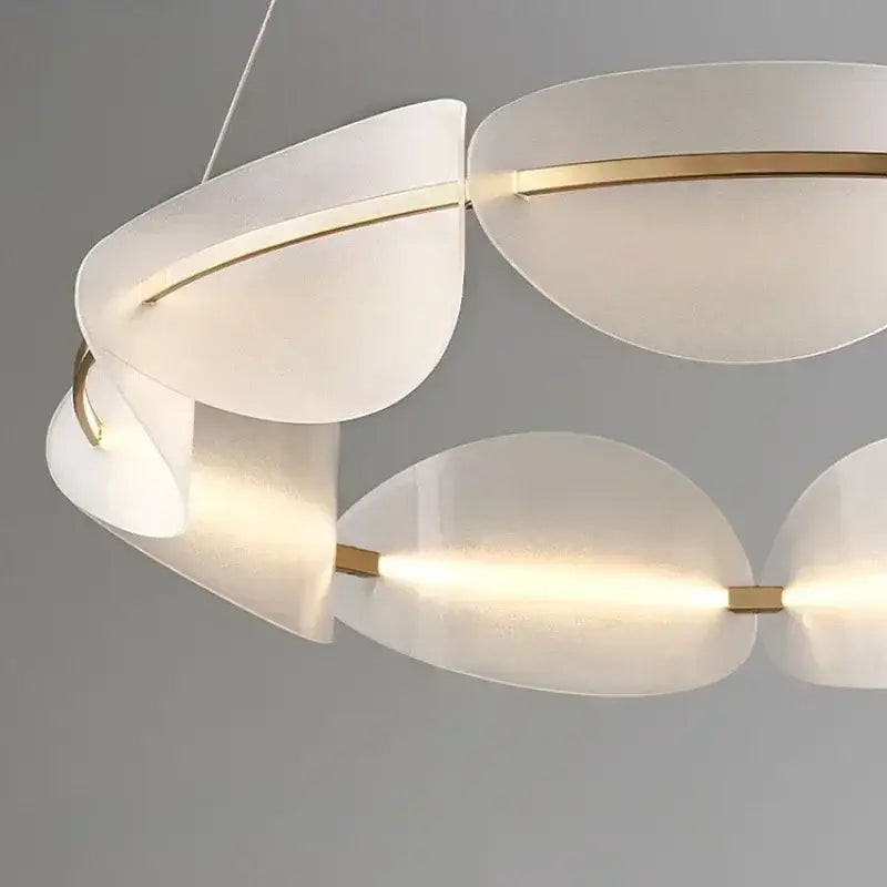 Modern white frosted acrylic ring chandelier with gold-toned metal accents dimmable for dining room by DecorBites