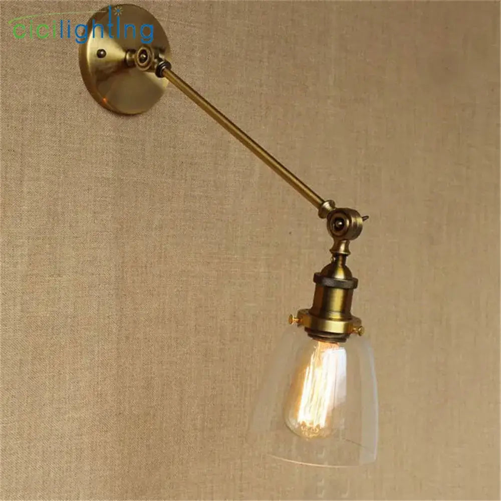Adjustable brass wall sconce with clear glass dome and exposed edison bulb wall lamp by decorbites brass copper