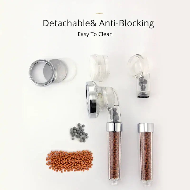 Silver-finished adjustable high pressure shower head with transparent filters containing brown and gray filtration beads