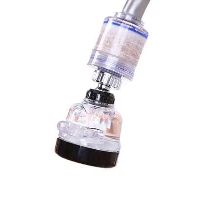 Adjustable white and gray modes faucet aerator with clear plastic and black filter showing sediment-filled cartridge visible