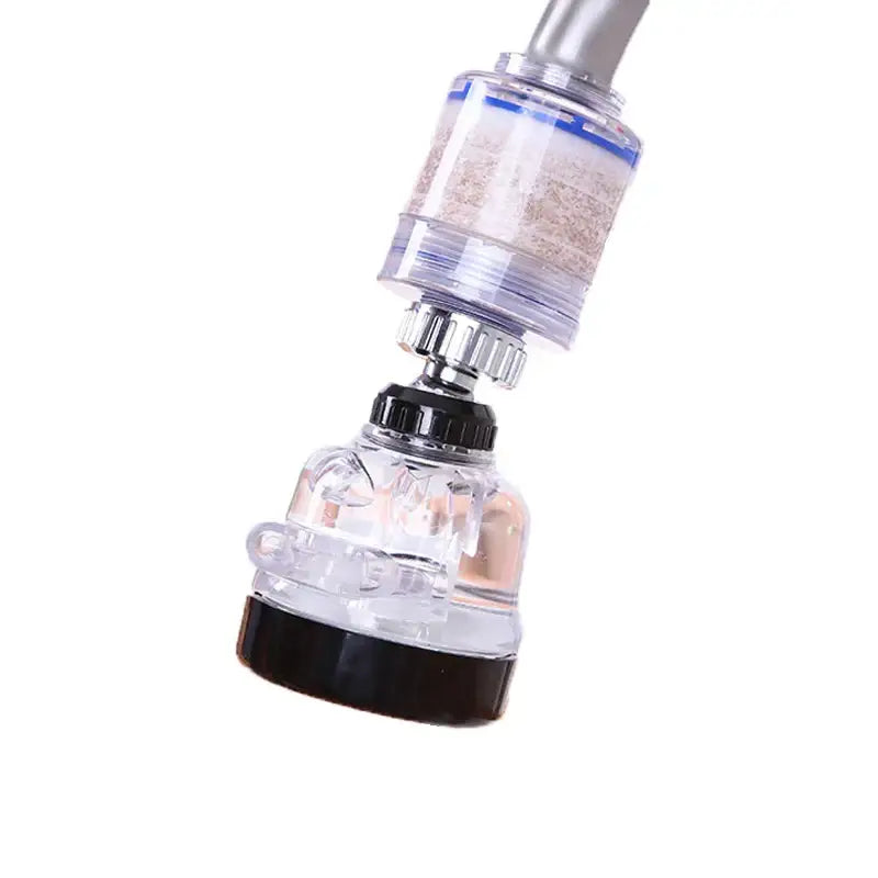 Adjustable white and gray modes faucet aerator with clear plastic and black filter showing sediment-filled cartridge visible