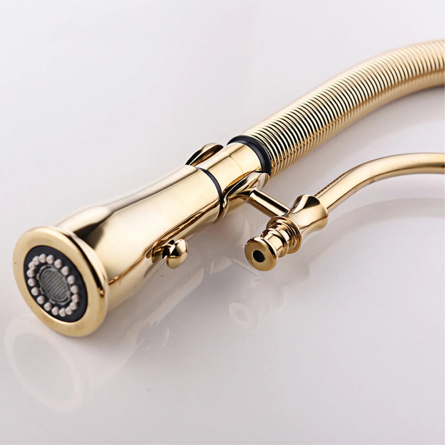 Aitana luxury gold brass kitchen faucet with single handle, single hole, flexible hose, pull-out spray, and decorative spheres