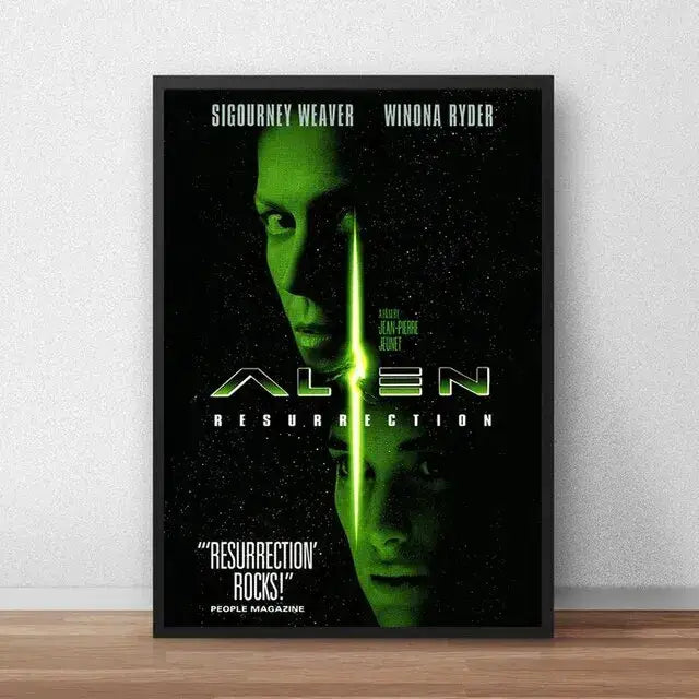 Black-framed decorbites™ alien movie poster canvas painting featuring green-tinted faces and glowing title text