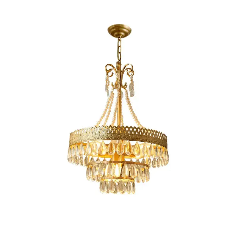 Gold-toned amber crystal water drop chandelier with cascading teardrops and ornate metalwork for dining room decorbites crystal water drop pendant light