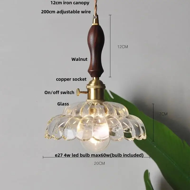 Amber flower glass pendant light with dark walnut wood handle and brass accents for dining room pendant lights