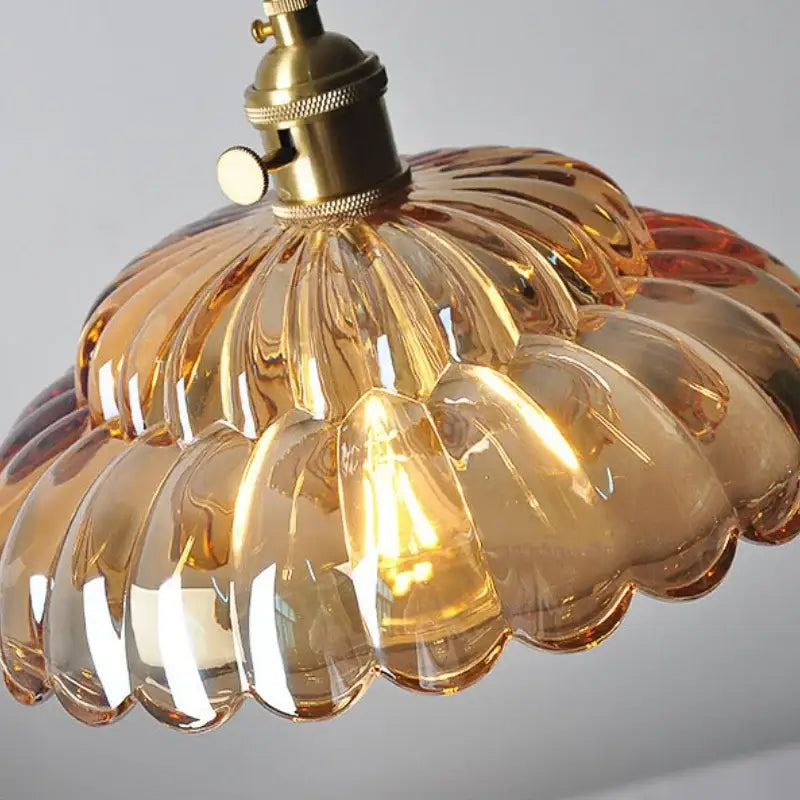 Amber flower glass pendant light with scalloped amber glass and brass finish socket for dining room pendant lights