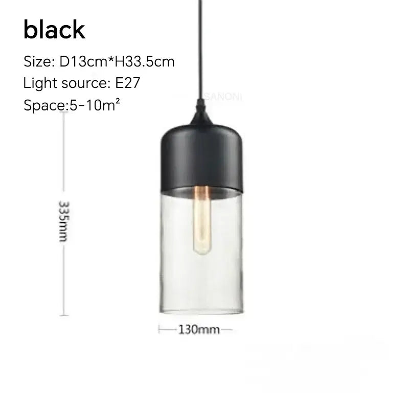 Black cylindrical pendant light fixture with clear glass body and exposed Edison bulb for dining room lighting