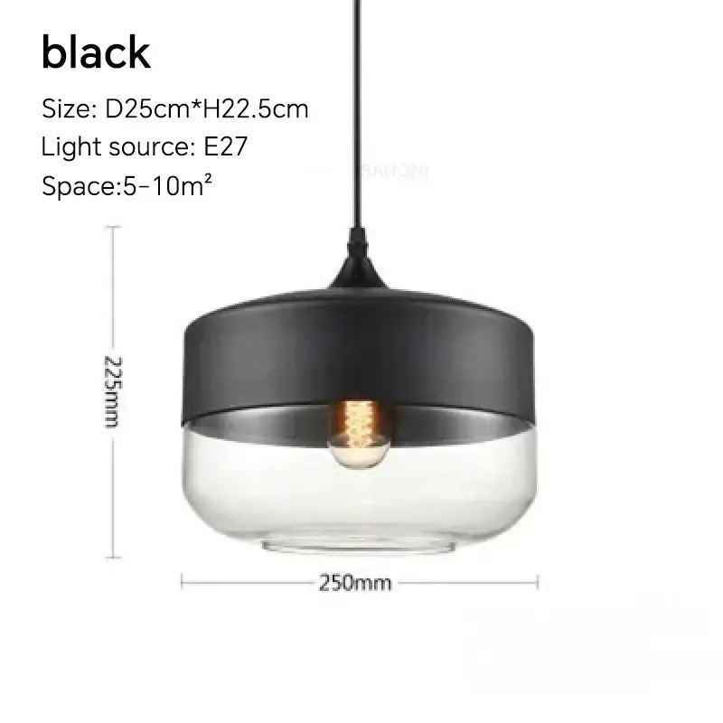 Black and clear glass pendant light fixture with sleek modern design for dining room featuring amber glass and natural wood