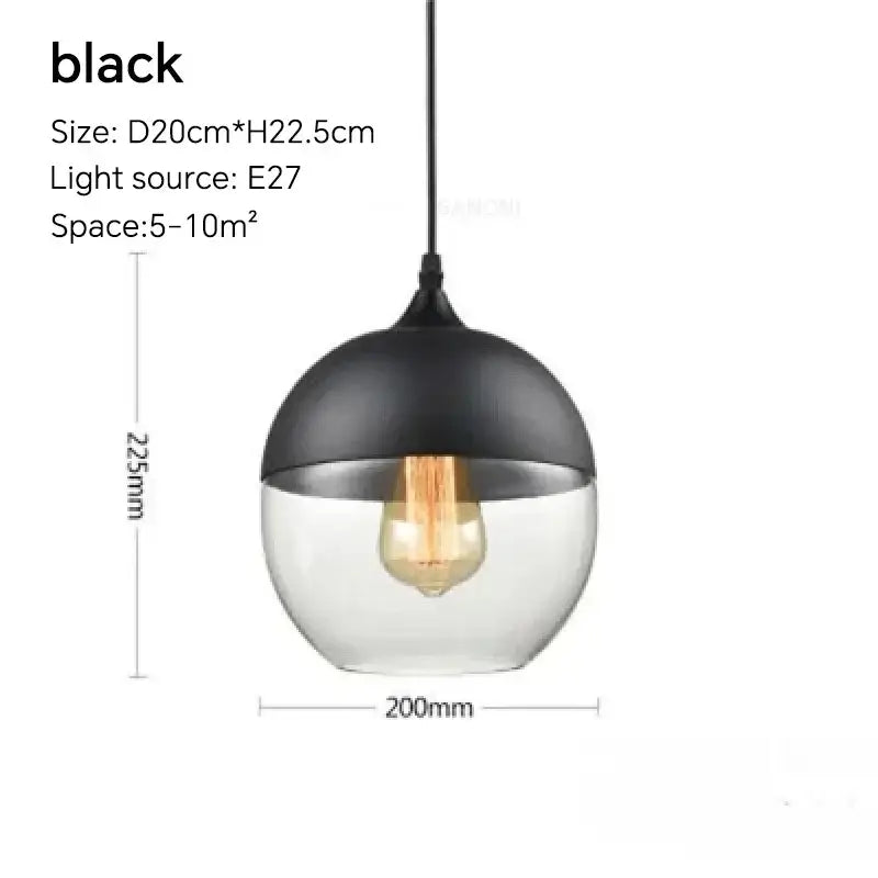 Black dome pendant light fixture with clear glass lower half and exposed Edison bulb for dining room use