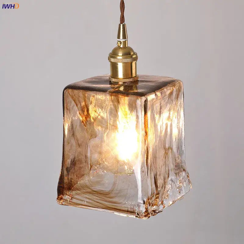 Amber-tinted textured glass copper pendant light with brass-finished socket for dining room copper pendant lights set