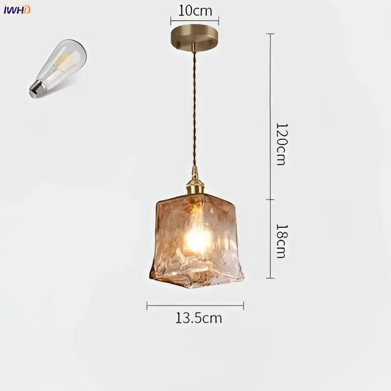 Amber glass copper pendant lights with warm-toned textured glass and brass-finished frame for dining room use