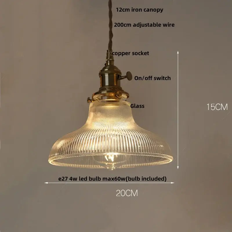 Vintage-style pendant lamp with amber glass led ribbed shade, brass finish, and adjustable iron canopy for kitchen use