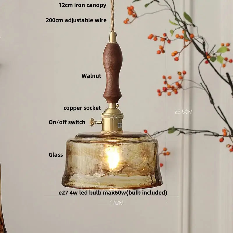 Amber glass pendant light with walnut handle and decorbites brass knob switch ideal for dining room lighting decor
