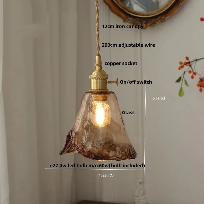 Amber glass pendant light with brass knob switch and textured copper socket for dining room decorbites brass knob