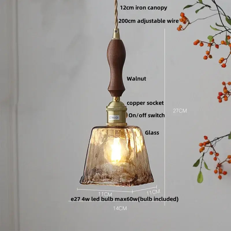 Amber glass pendant light with warm-toned textured glass, walnut handle, brass knob switch by decorbites for dining room