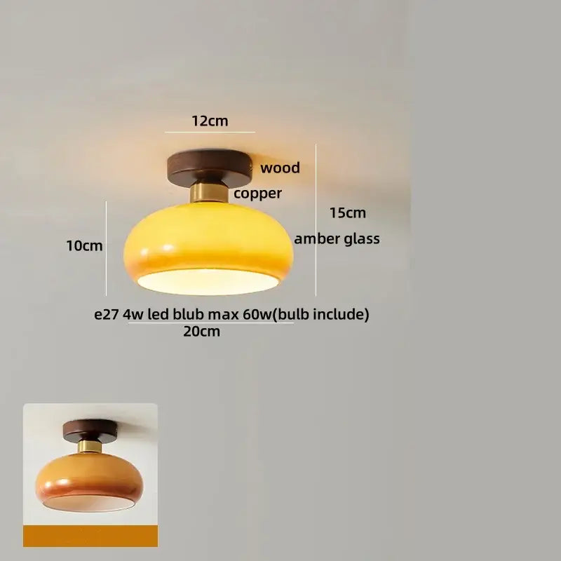 A warm amber glass wood copper led ceiling light with a wavy design for dining room use