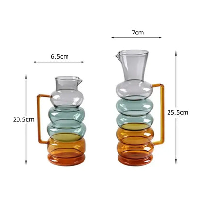 Two stacked amber and teal glass bubble ring vases with tiered colorful segments and gold-toned handles decorbites glass bubble