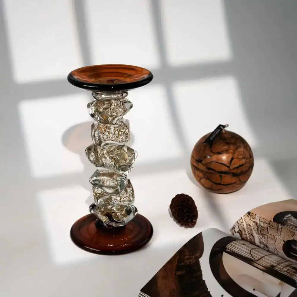 A tall amber twisted glass splicing candelabrum with textured body for dining room decor