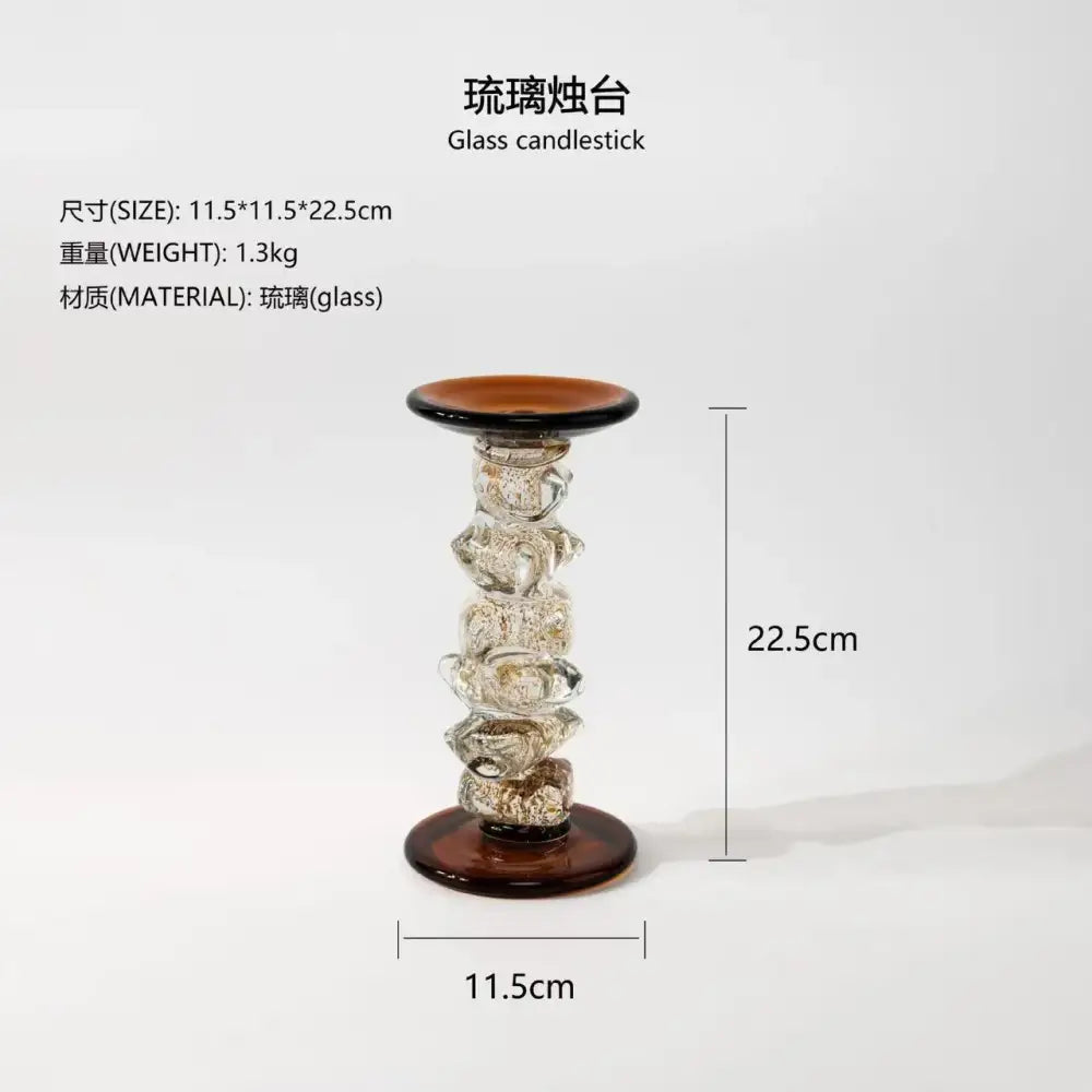 A tall amber twisted glass splicing candelabrum with dark amber base and top rim for dining room decor