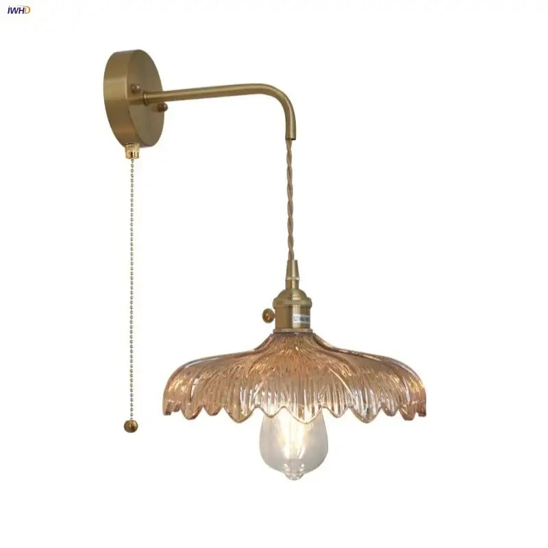 Brass-finished wall light with textured amber vintage led glass shade and twisted cord pull for decorbites amber vintage style