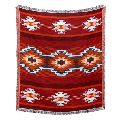 A richly patterned red woven blanket sofa cover with american country plaid tribal designs in cream black and light blue