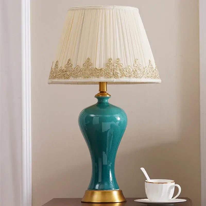 Teal american luxury ceramic table lamp with gold accents and cream pleated shade for bedroom decorbites american luxury
