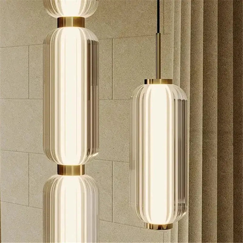 Modern cylindrical pendant light with frosted glass and gold accents for american retro glass staircase pendant light