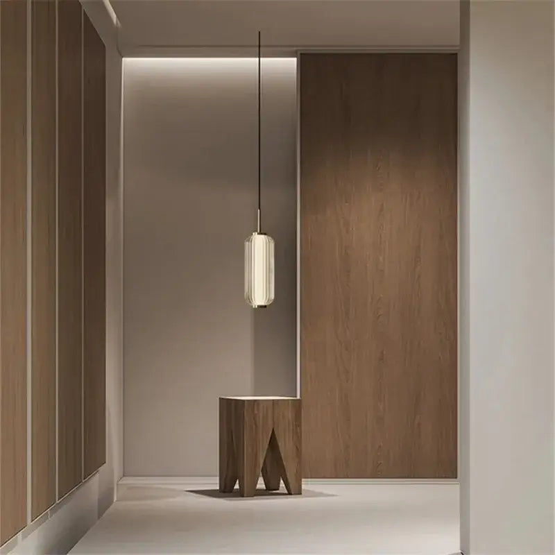 Minimalist american retro glass staircase pendant light with cylindrical frosted ribbed shade and black cord suspension