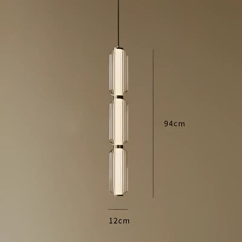 A modern american retro frosted glass staircase pendant light with three stacked cylindrical shades and metallic frame