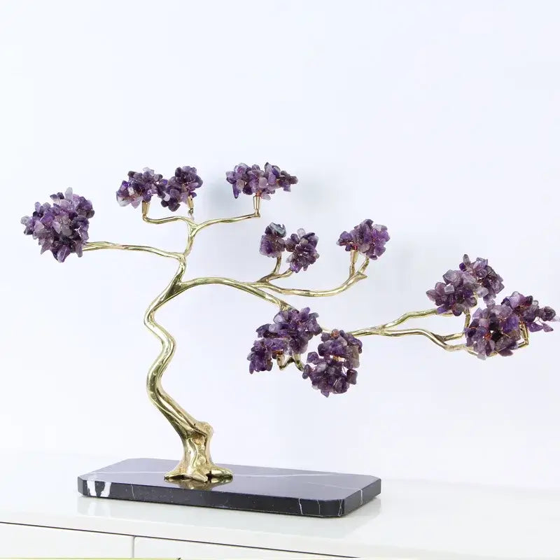 Amethyst and gold metal decorative figurine with brass branches and purple crystals on a black marble base for decor