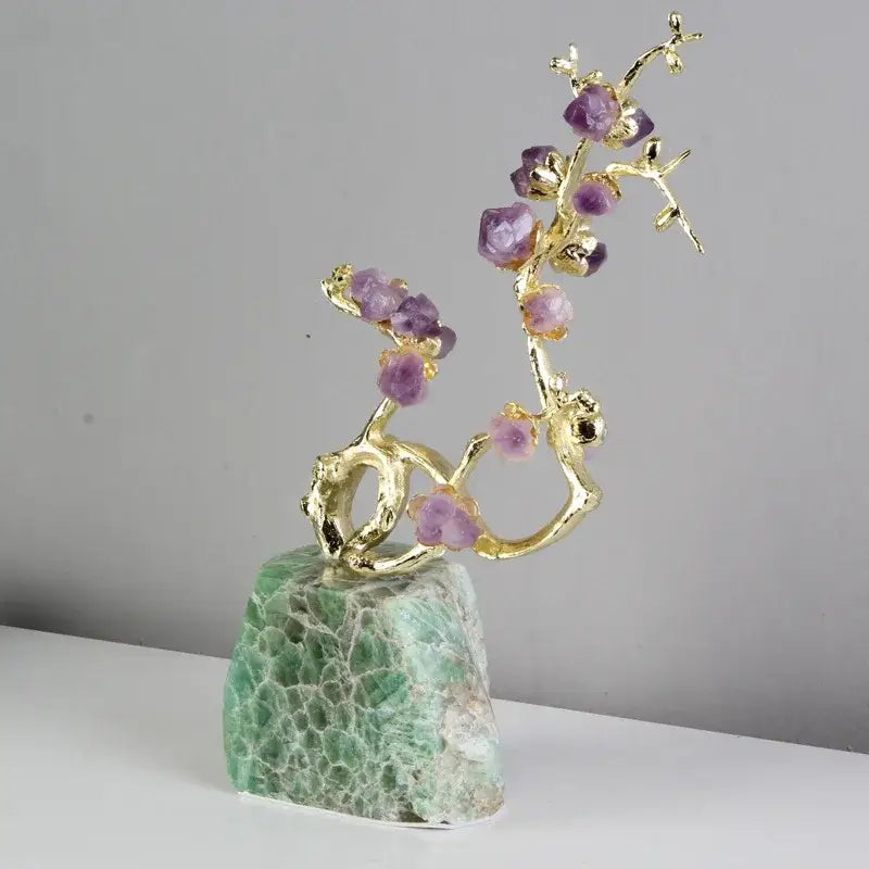 Delicate amethyst brass tree ornament with gold-toned branches mounted on a green moss agate base for living room decor