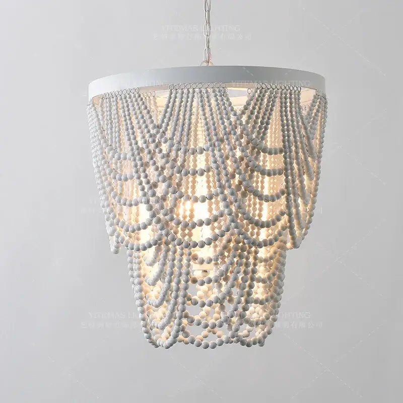 Antique black wood beaded pendant chandelier with cascading white wooden beads for dining room decorbites black wood style