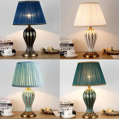Elegant antique blue ceramic desk lamp with fluted fabric shade and gold accents for bedroom table lighting
