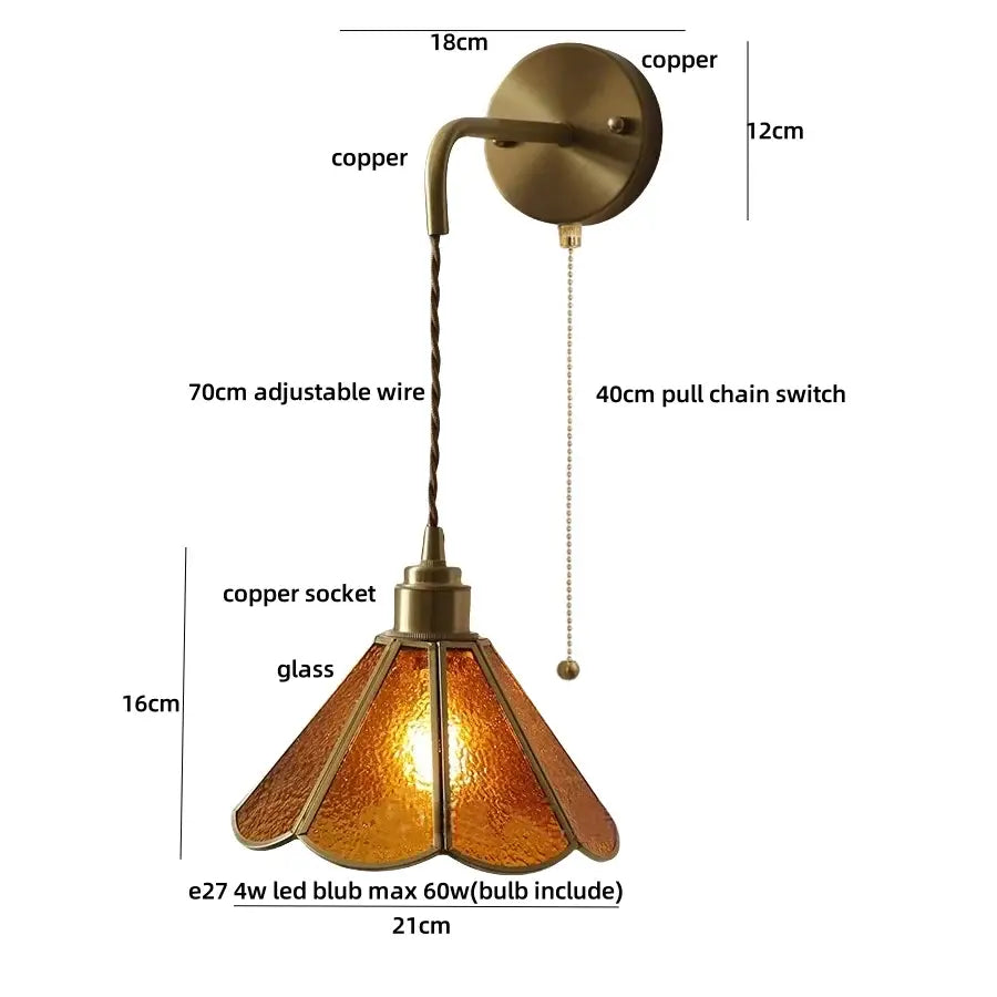Antique brass-finished copper wall sconce with textured amber glass shade and adjustable wire for decorbites blue glass led lighting