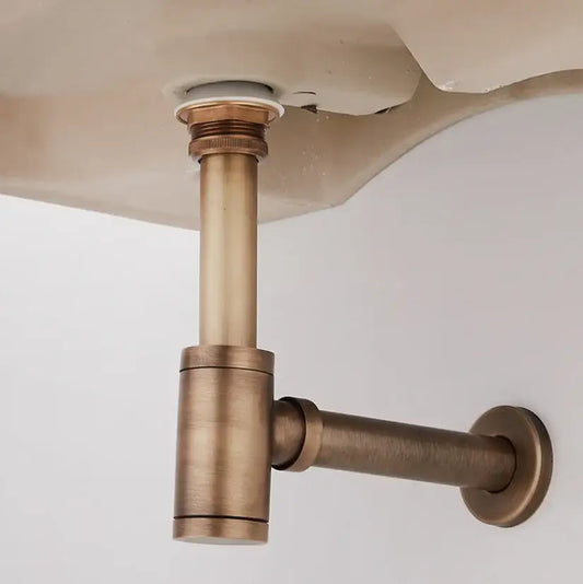 Antique brass air isolation drain pipe with vintage finish and threaded connections for bathroom sink installation