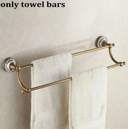 Antique brass double towel bar with ornate ceramic wall mounts in decorbites bathroom accessories set for bathroom decor
