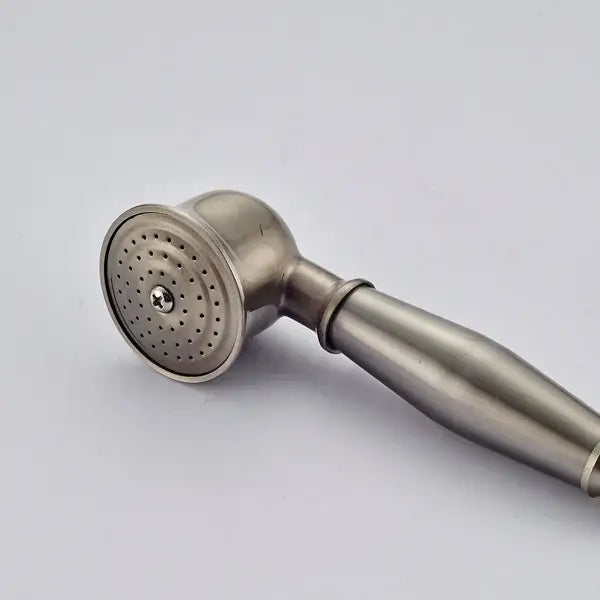 Antique brass and chrome hand shower head with stainless steel brushed finish and circular perforated spray face