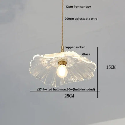 Antique brass and glass led pendant lamp with a fluted translucent glass design and brass accents for kitchen lighting