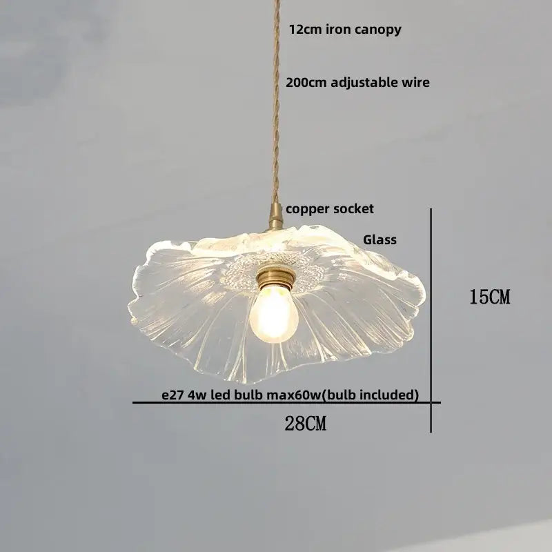Antique brass and glass led pendant lamp with a fluted translucent glass design and brass accents for kitchen lighting