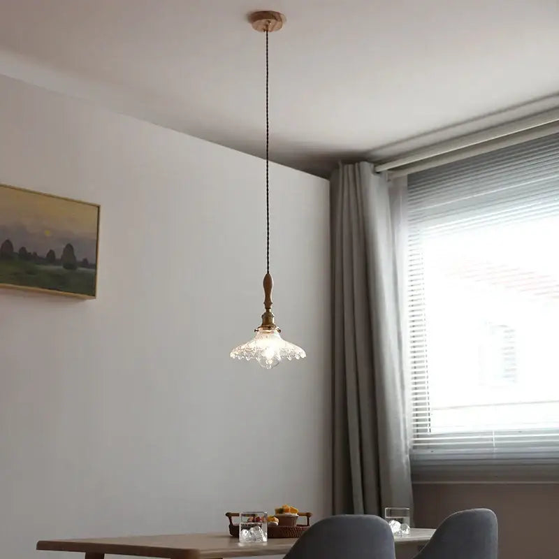 Antique brass and glass led pendant lamp with ornate clear glass shade and brass finish for kitchen lighting