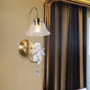 Antique brass angel glass sconce light with frosted glass shade and attached white angel figurine for bedroom wall lamp