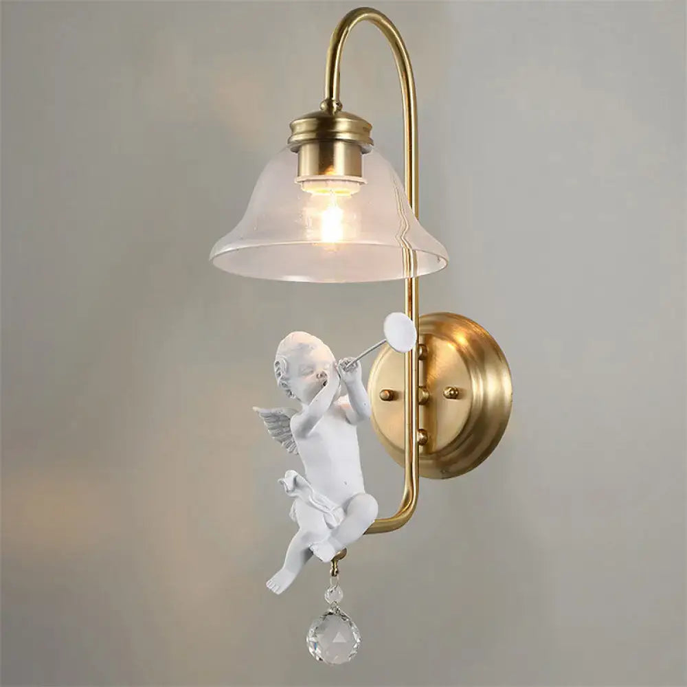 Antique brass angel glass sconce light with white figurine holding trumpet and clear glass for bedroom wall lamp