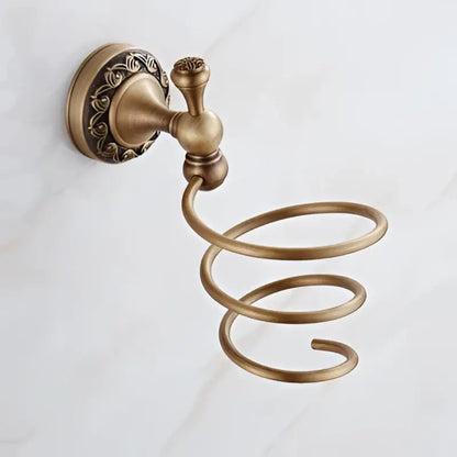 Antique brass bath hardware towel ring with ornate scrollwork and coiled spiral design in brass antique bath decorbites style