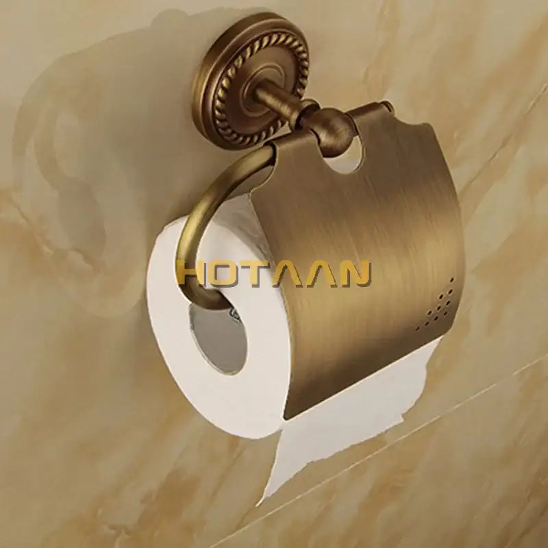 Antique brass bathroom accessories set featuring a decorbites brass bathroom toilet paper holder with ornate perforated cover