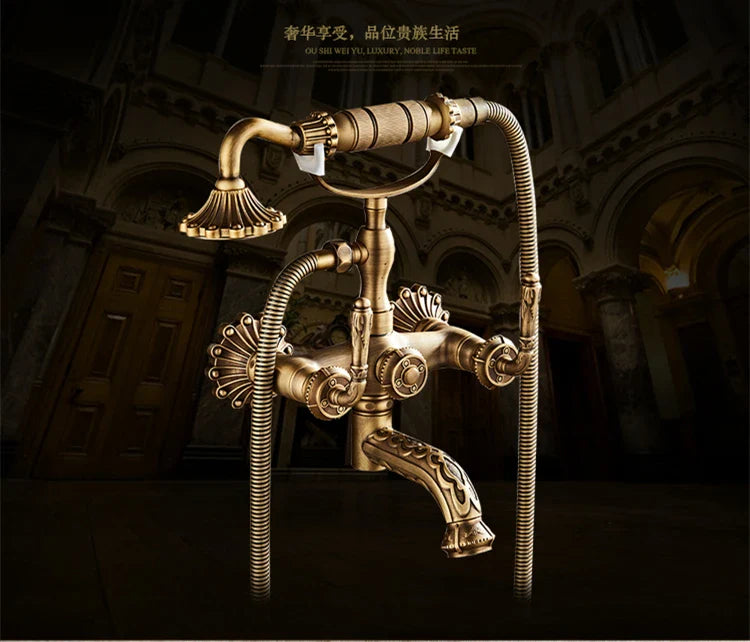 Antique brass bathtub shower set featuring vintage-style bathroom faucet with ornate fluted spout and decorative handles