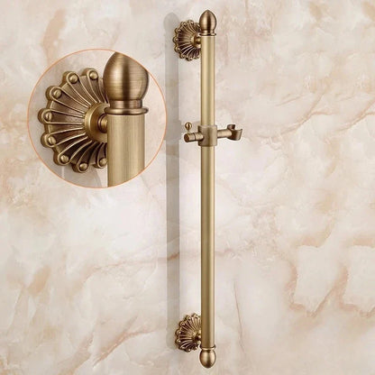 Antique brass bathtub shower set featuring an antique brass-finished sliding shower rod with ornate fan-shaped end caps